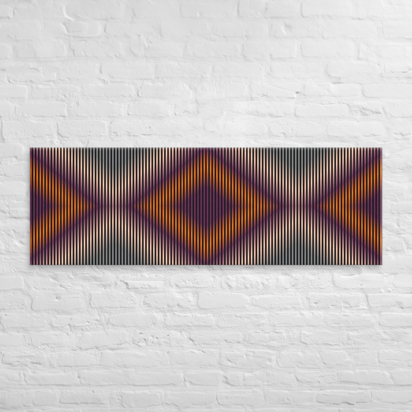 Cuadro abstracto con patrones de rombos en tonos morados, naranjas, beige y gris sobre pared de ladrillo blanco.